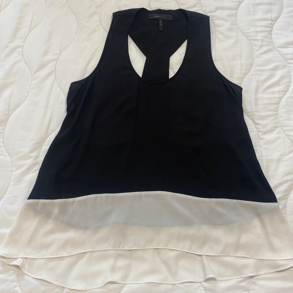 Flowy black and white shirt with open back